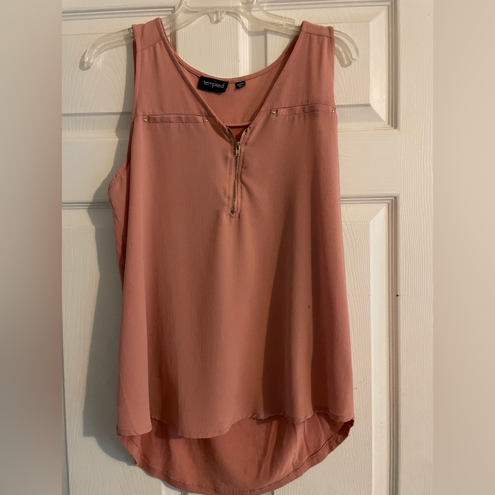 Sleeveless pink zip top